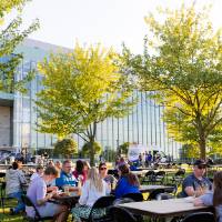 Overview picture of families attending Kickoff Party on Kirkhof Lawn.